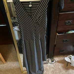 Black and white asymmetrical dress. Shows off curves!